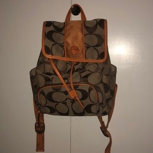 Orange and tan coach backpack purse